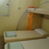 Camera con letto a castello e singolo.