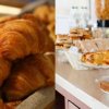 Croissant e pane su un tavolo da colazione.